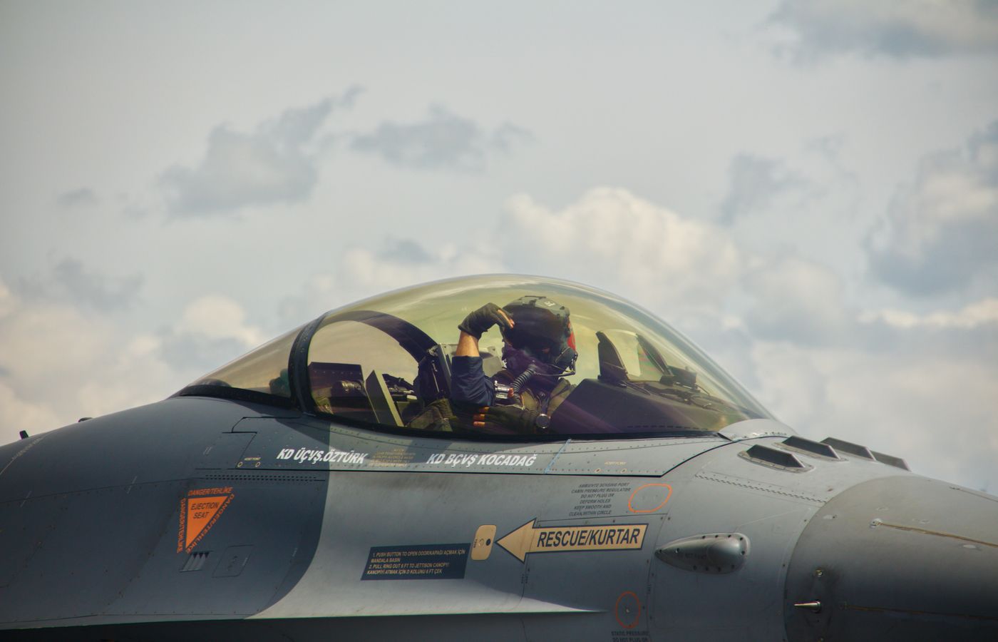 Fighter pilot in the cockpit canopy