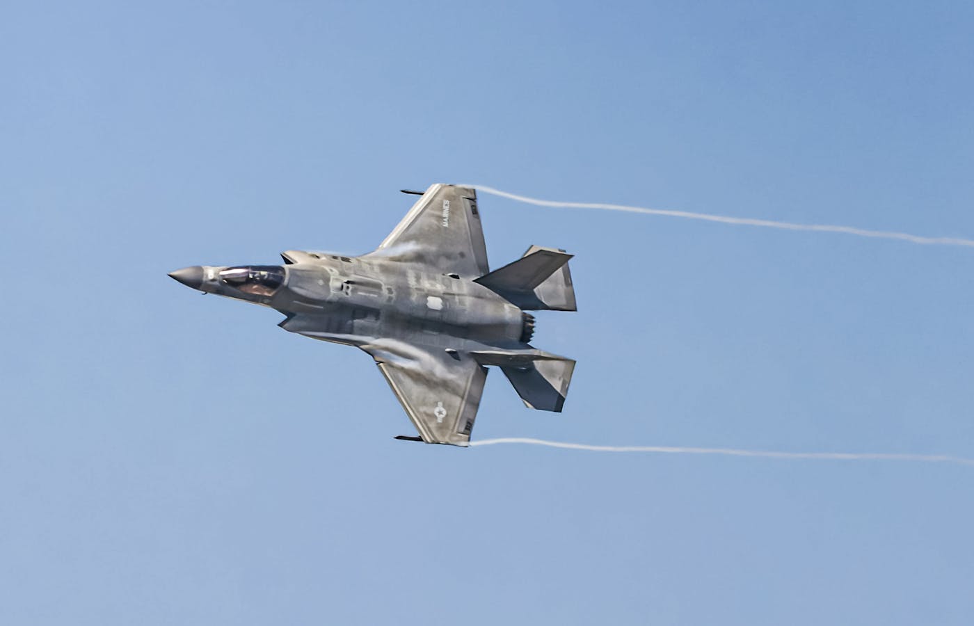 F-35 Lightning II stealth fighter banking in flight